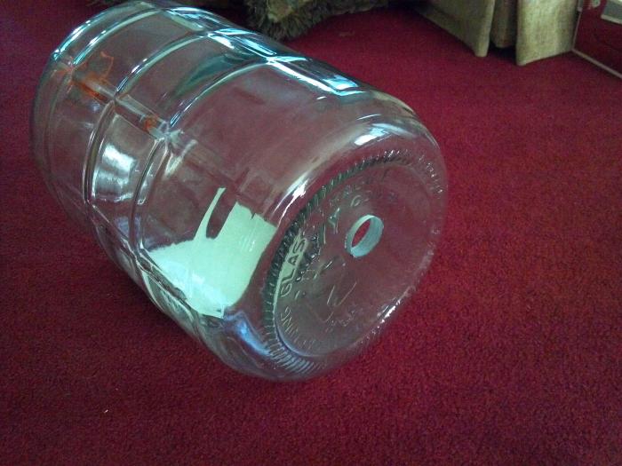 Glass carboy top with hole.jpg