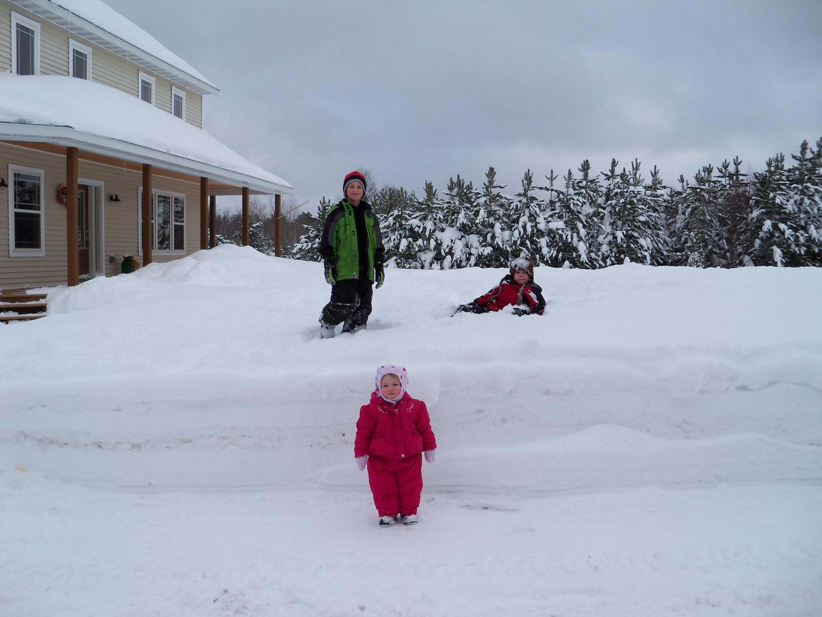 Kids on snow bank.jpg