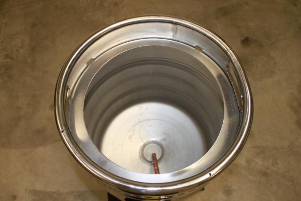 Another picture of inside the keggle.  Cut keg with my 4 1/2" grinder and a template/jig that I duplicated from another posting online.  I used a 1/8" cutting wheel.  The outcome was better than a plasma cutter and left very little to clean up.
