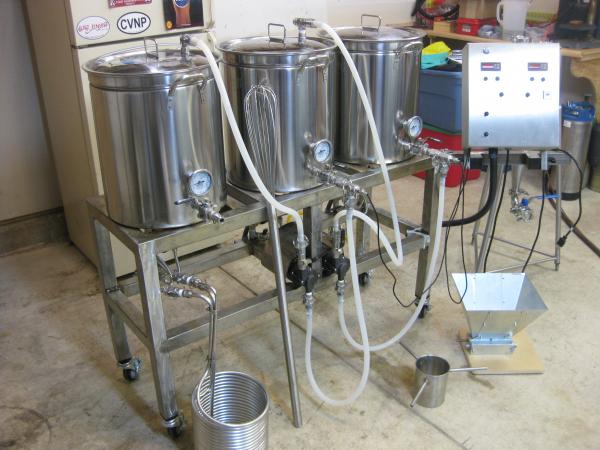 My newly finished Brutus 10.

15.5 gallon kettles, Jamil-O-Chiller, Hop Spider, Mash Whisk