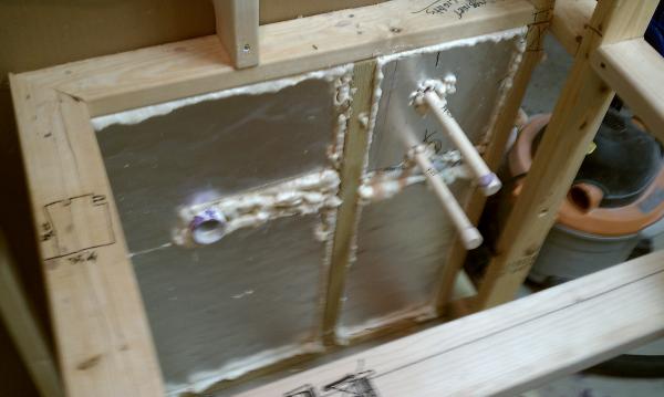 Hot and cold water supply and the very first panels of insulation.