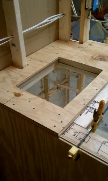 Just screwed down the lamiated plywood substrate for the fixed side with the sink.