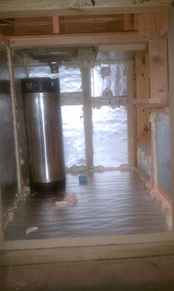 From the doorway to the utility room, looking through the bar.  Sink is dryfit and corney showing clearance.