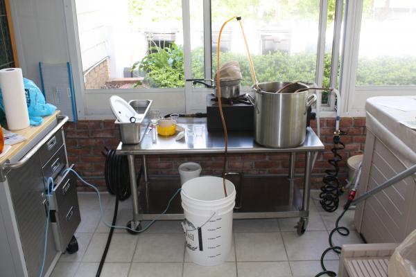 After brewing, I use a double wort chiller setup to cool it down.  Here the wort is being racked into a primary after cooling.