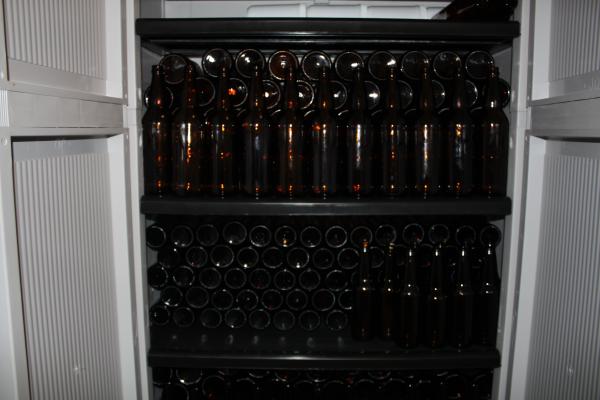 Clean bottles are stored in a clean tight cabinet until needed.  If there are bottles in the cabinet, I need to brew, if the cabinet is empty, I need to stop.