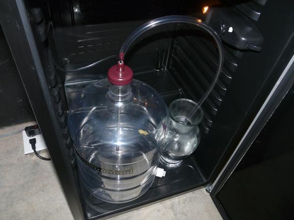 6 gallon Better Bottle (11 3/8") and blowoff jar (6 1/2")
A little less than 10" from top of carboy to top of fridge