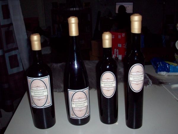 The 4 types of bottles I used.  Most were of the type to the far left, except for the 12 bottles of the far right type I made as gifts.
