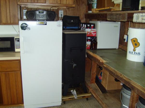 Fermenting refrigerator (Ranco 2-stage controller), meat smoker, empty bottles, dorm refrigerator for cold brews.