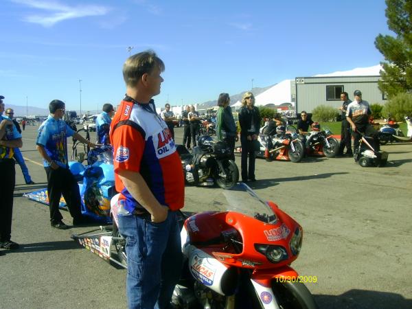Holding up bike waiting to go to line