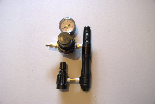 Here is the completed regulator assembly.  The use of the hard piped nipples instead of classic braided co2 line used in paintball means the entire assembly will stay rigid when installed on a co2 tank.  Instead of using the 1/8" NPT nipples you coul