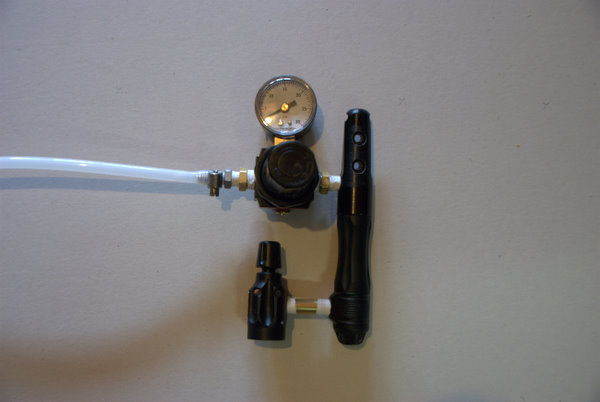 Here is the Gas Line held on to the "Hose Barb" quick disconnect fitting I used.  There are many different hose barbs available for your co2 line.  You could in theory use a 1/4" to Hose Barb fitting and do away with one bushing completely.