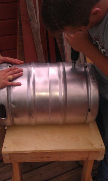 Drilling the hole for the Mash Tun's ball valve.