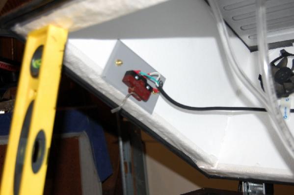 Lid switch to shut off compressor and fans