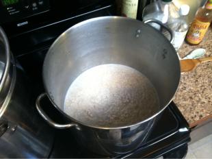 2 lbs of rolled oats being prepared for mash.