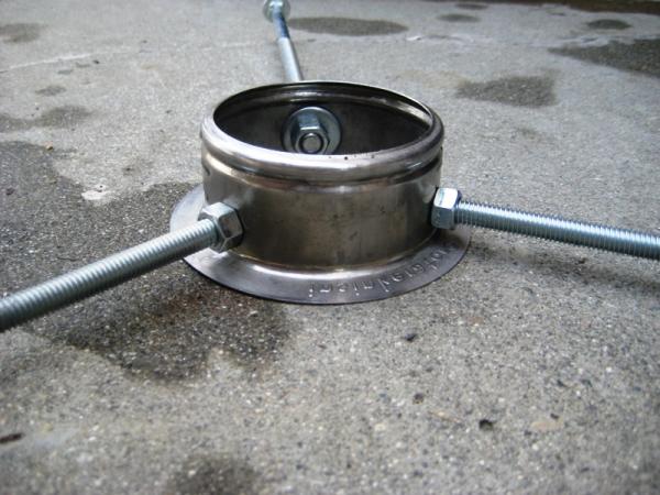 Lip on the garbage disposal fitting to help hold the hose clamp on