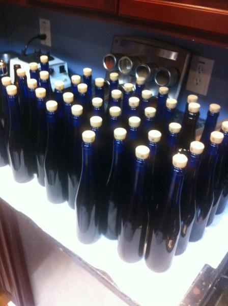 I got a hold of some beautiful 375 ml cobalt blue bottles and decided to use belgian corks and wire hoods.