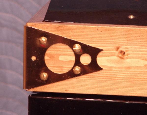 Here's one of my corners I made. They are mad from solid brass door kick plates that I picked up from the local scrap yard.