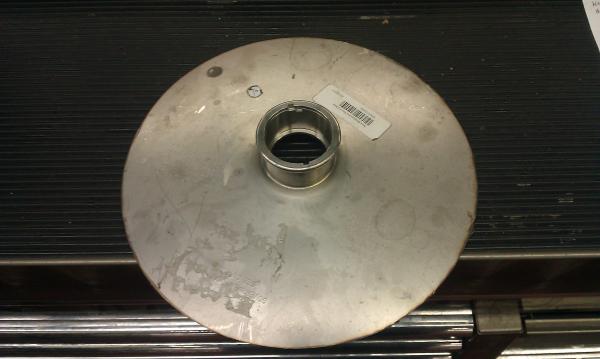 top cut off of keggle with a pneumatic cutting tool.