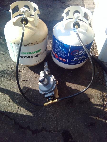 Here is our "High-to-low" pressure regulator. It is a modle normally made for house and it is written on it that can handle between 9 to 13 WC but is supposed to be set on providing 11WC. I'll update the info with the model numer later.