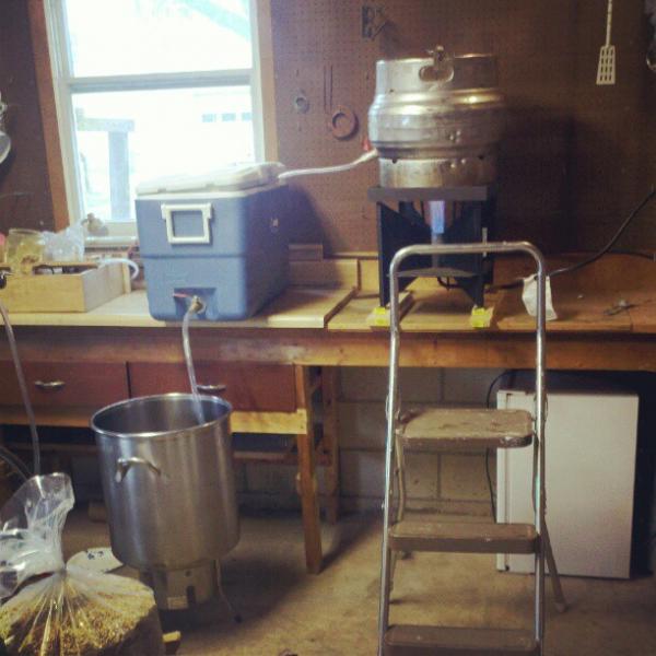 My modest setup.  It's a start.

HLT (Quarter Keg for now) --> 52qt Colman Extreme cooler MLT with a ball valve/braided hose setup --> SS boil kettle.

Underneath you'll notice the mini fridge that I want to build a fermention chamber around und