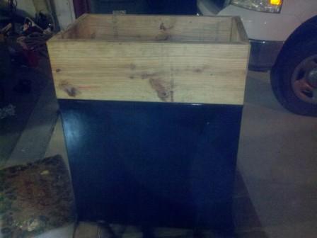 Beveled 2x12 and sizing collar on freezer.