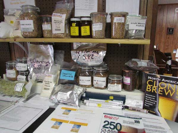 survival shops 001 Grains Recipies, some hops, somebooks, some honey (local)