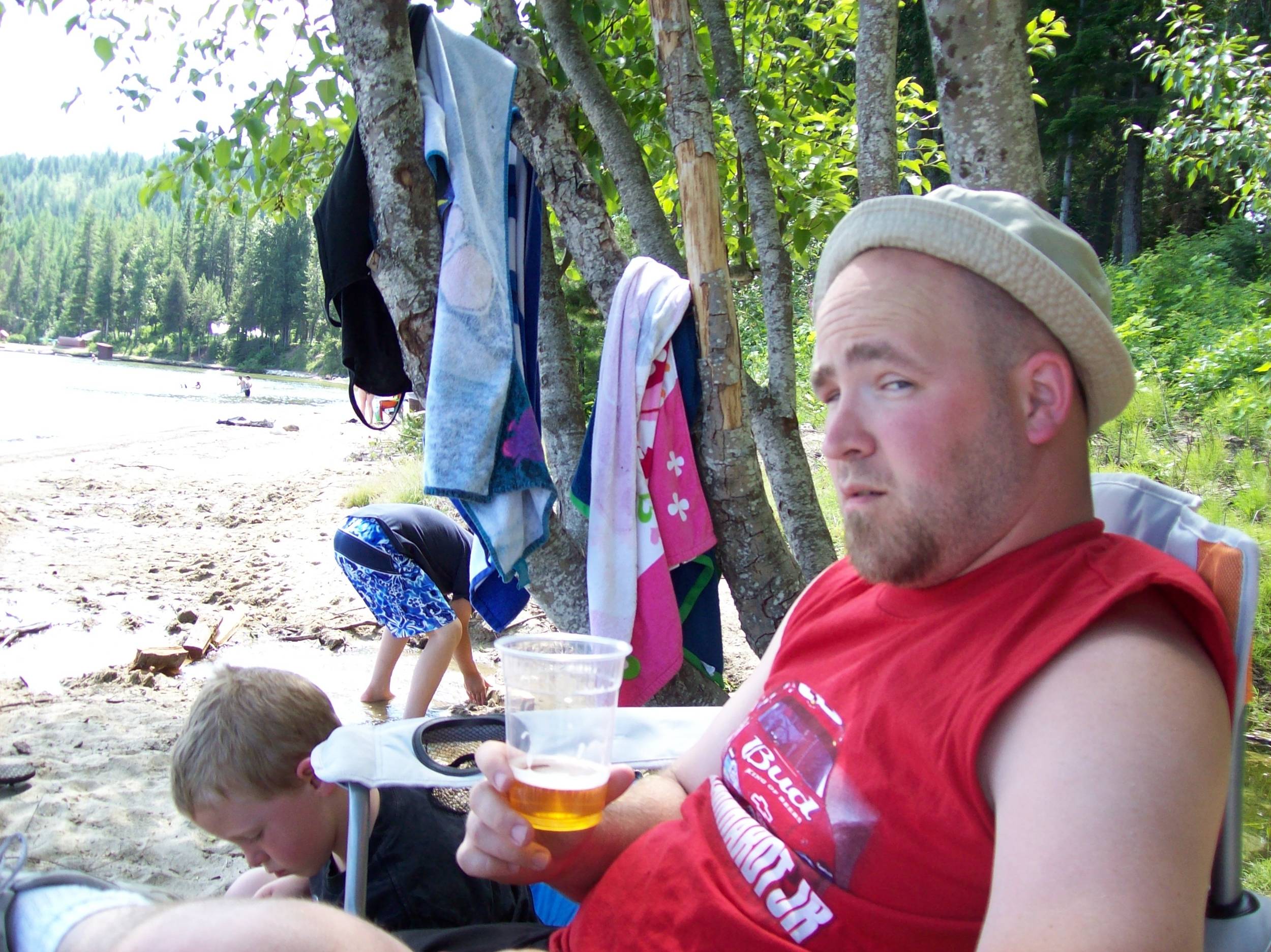 Justindrinkingbrewonthebeach