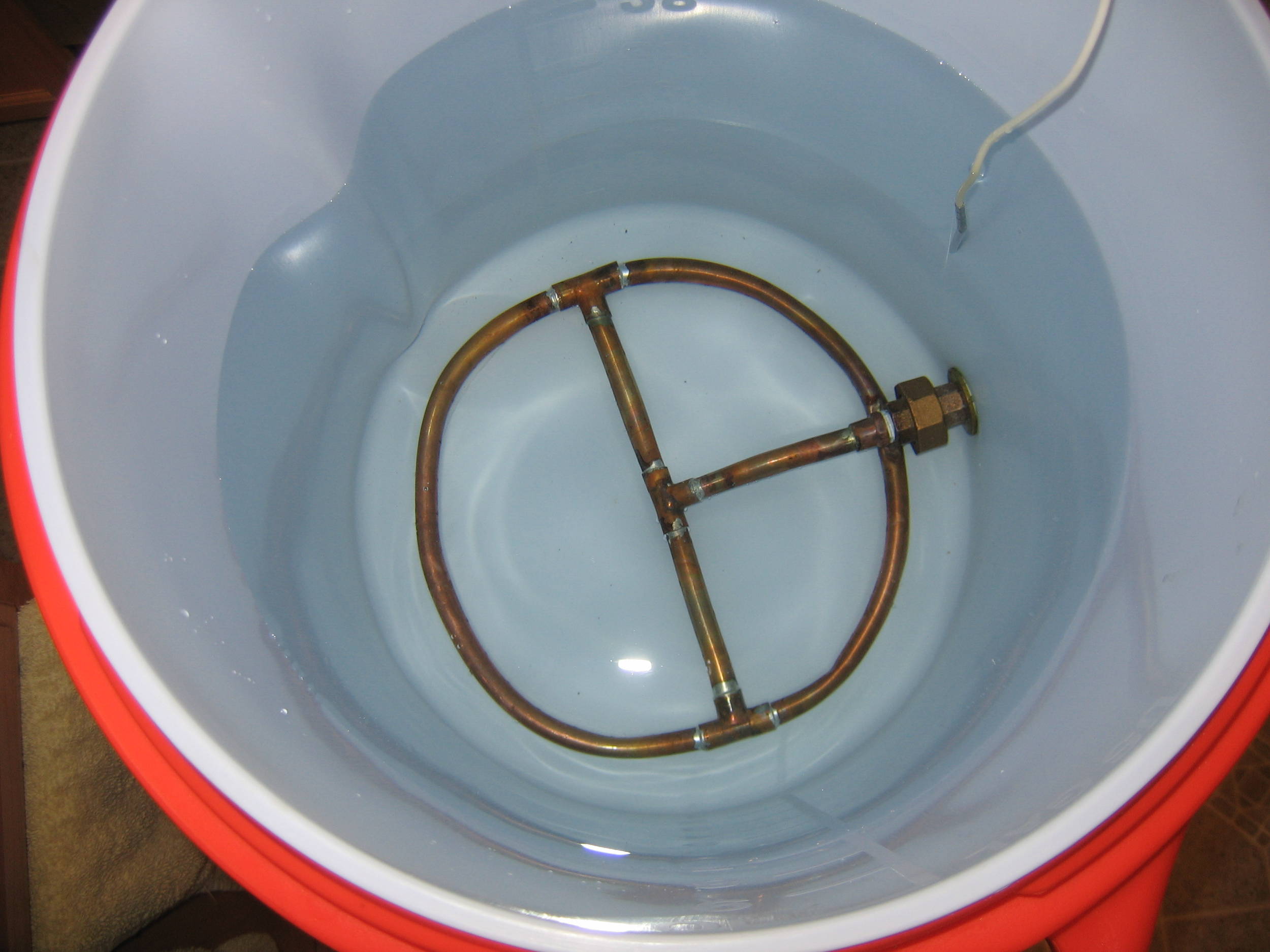 SIMS injection and drain manifold