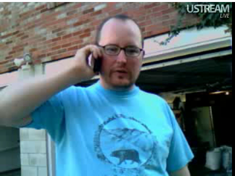 opher_on_phone