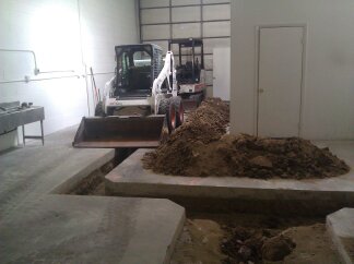 diging up the brewery space for floor drains
