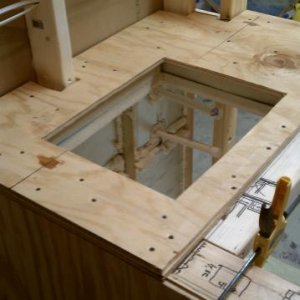 Just screwed down the lamiated plywood substrate for the fixed side with the sink.