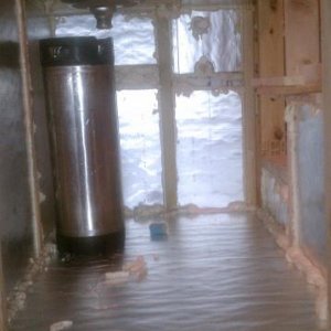 From the doorway to the utility room, looking through the bar.  Sink is dryfit and corney showing clearance.