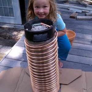 Wrapping 50' of 1/2" Refrigeration coil around a Corney with some help from the world's foremost 6-year old expert on beer aroma.