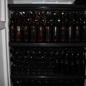 Clean bottles are stored in a clean tight cabinet until needed.  If there are bottles in the cabinet, I need to brew, if the cabinet is empty, I need to stop.