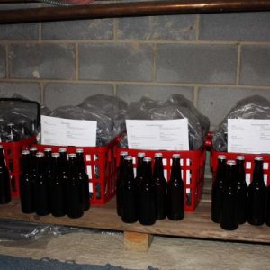 Since I have no basement, I have to use a crawl space which works just fine.  I keep bottles in these red "Circuit City" shopping baskets that hold almost one batch.