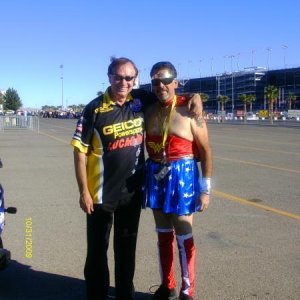 Forest and our WONDERFUL Wonder woman , He 's wearing this outfit cause he lost a bet to his sister . Who's grining now.