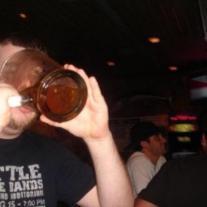 Chugging a pitcher to score $20 from my friend