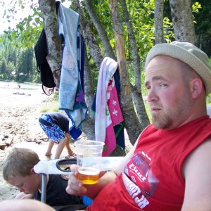 Justindrinkingbrewonthebeach