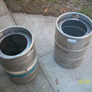 Keg Conversion - This is the start of what my new setup will be using.  Used an angle grinder to cut the tops off.  Still have to drill the holes for the fittings.
