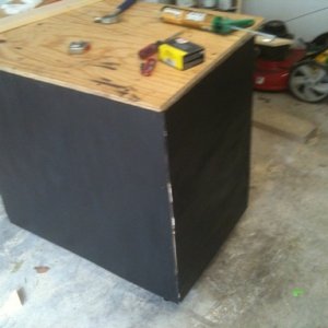 The stained panneling is attached