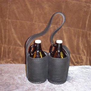 TwinGRIP Model holds TWIN GROWLER Bottles