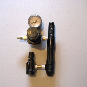 Here is the completed regulator assembly.  The use of the hard piped nipples instead of classic braided co2 line used in paintball means the entire assembly will stay rigid when installed on a co2 tank.  Instead of using the 1/8" NPT nipples you coul