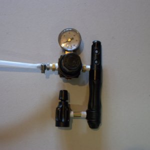 Here is the Gas Line held on to the "Hose Barb" quick disconnect fitting I used.  There are many different hose barbs available for your co2 line.  You could in theory use a 1/4" to Hose Barb fitting and do away with one bushing completely.