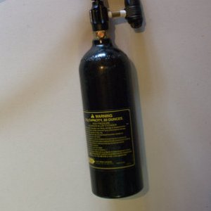 Here is the completed assembly with a co2 tank.  After a long day of paintball, either a tournament paintball or 26hr scenario paintball game you are now ready for a nice cold beer.  Usage is simple:

1.  Attach tank to regulator and hose to keg co2 in
