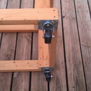 Close up of our casters.  Simple 200 lbs capacity, Lowe's special.
