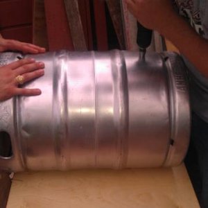 Drilling the hole for the Mash Tun's ball valve.