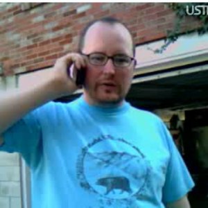 opher_on_phone