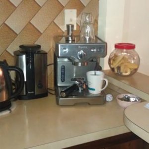 Coffee!! Yep - I've hacked the grinder for a finer grind and use a non pressurized basket.