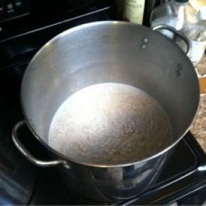 2 lbs of rolled oats being prepared for mash.