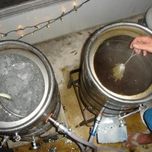 HLT with 40 pounds of ice chills boiling wort to 65 in minutes.
